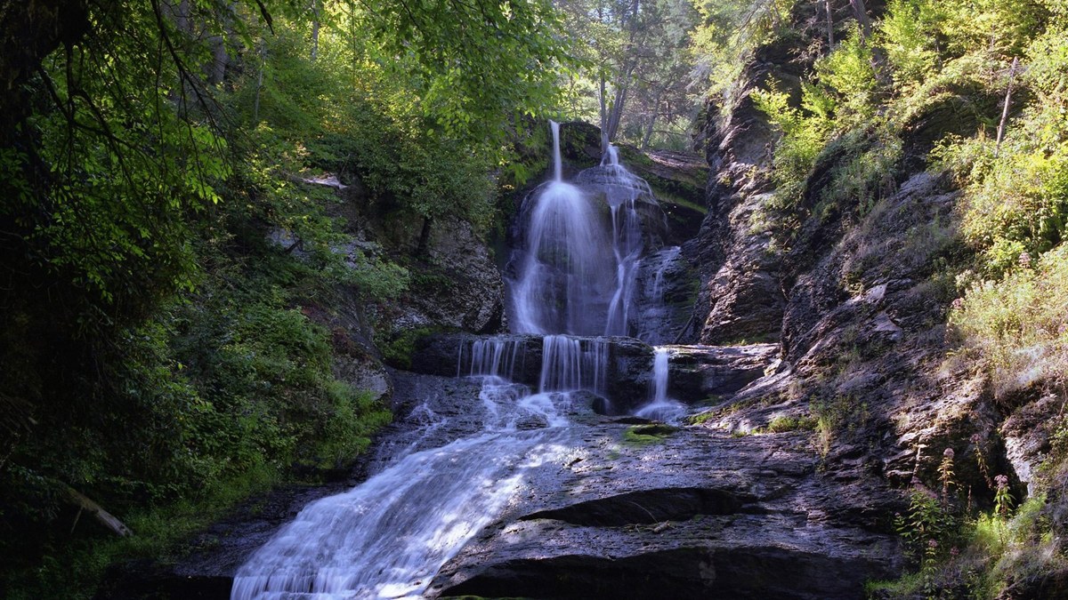 Dingmans Falls cascading through the forest in Delaware Water Gap National Recreation Area