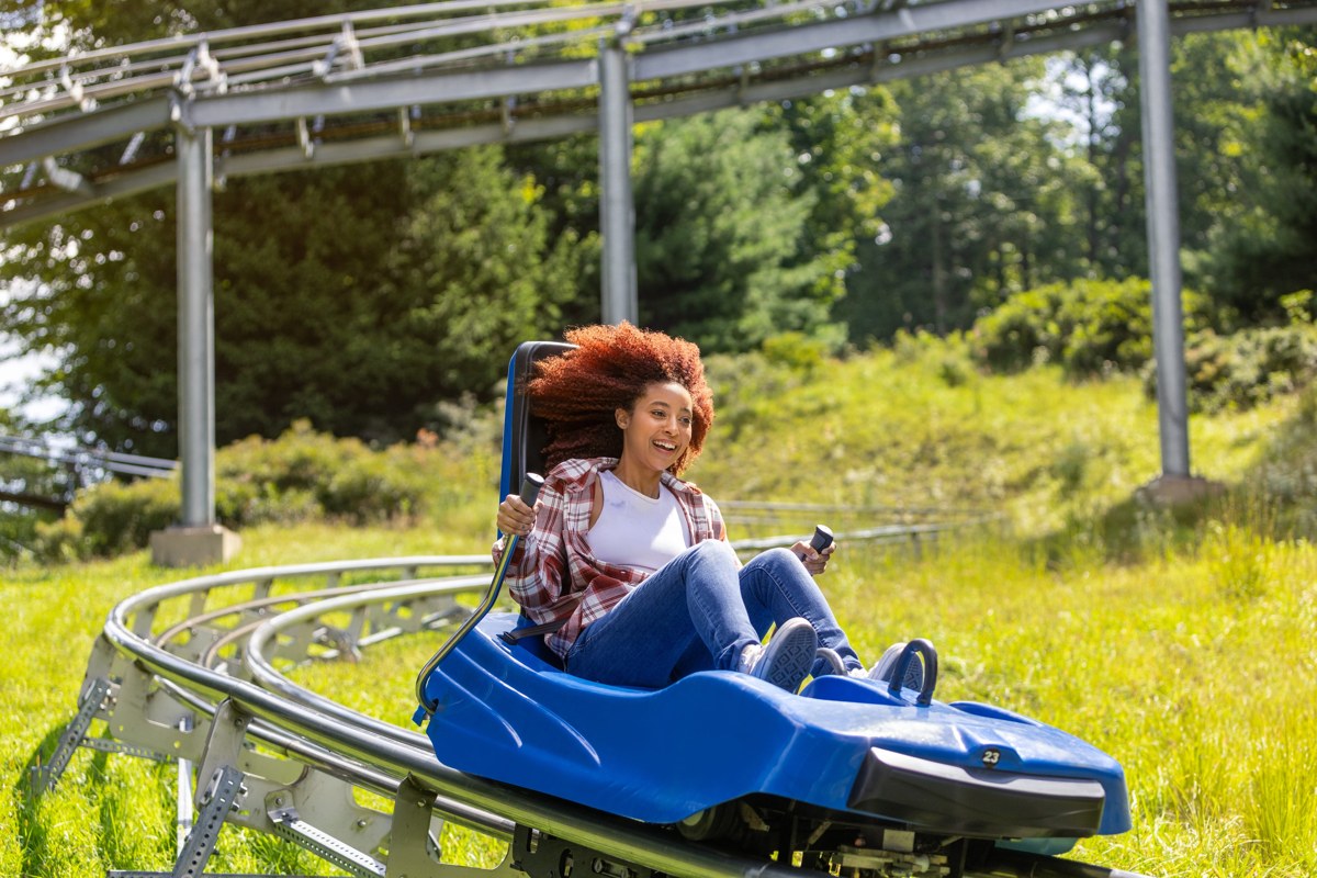 Rider on the mountain coaster at Camelback Mountain Adventures